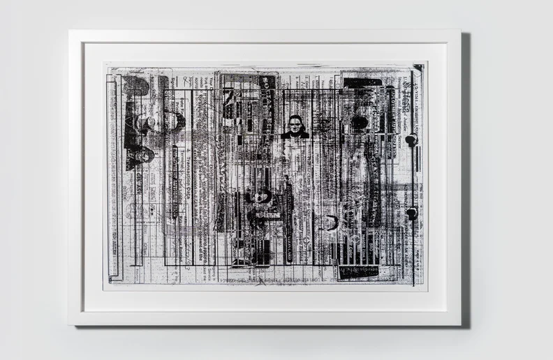 White frame holding black-and-white Xerox collage of layered newspaper text, smeared portraits, barcode-like stripes and ink streaks.